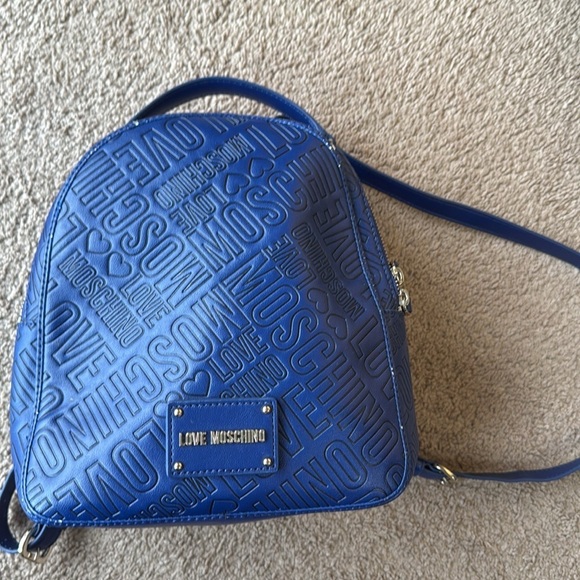 Love Moschino Blue Signature Embossed Classic Medium Backpack - Picture 1 of 13